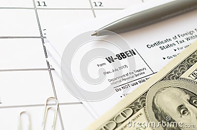 IRS Form W-8BEN Certificate of foreign status of beneficial owner for United States tax withholding and reporting for individuals Editorial Stock Photo