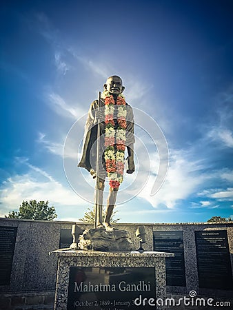 IRVING, TX, US-NOV 4, 2018:Vintage tone the statue of Mahatma Gandhi in Mahatma Gandhi Memorial Plaza. Monument in Thomas Editorial Stock Photo