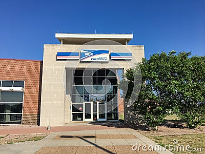 Facade entrance of USPS store in Irving, Texas, USA Editorial Stock Photo