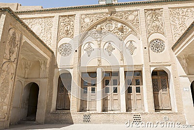 Isfahan Province- Kashan IRAN-April 30- 2019 wooden windows and wall carving inside Borujerdi house Editorial Stock Photo