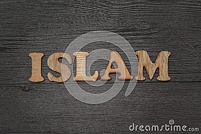 Islam title text word. Wooden alphabet letter blocks Stock Photo