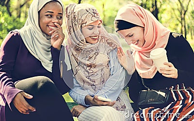 Islamic women friends talking and having fun Stock Photo