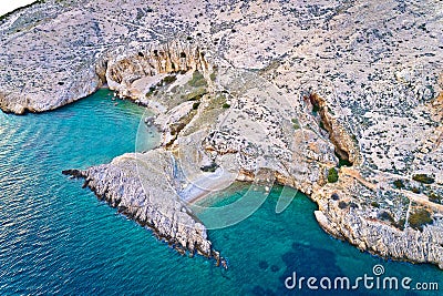 Island of Krk idyllic pebble beach with karst landscape aerial view, stone deserts of Stara Baska Stock Photo