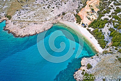 Island of Krk idyllic pebble beach with karst landscape aerial view, stone deserts of Stara Baska Stock Photo