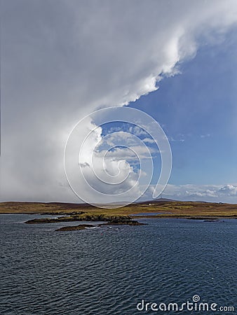 The isle of Bressay and Bressay Sound with a dramatic weather front moving in over the Islands. Stock Photo