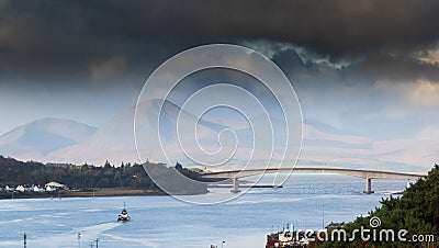 Isle of Skye Bridge, ocean, boat under the bridge Editorial Stock Photo