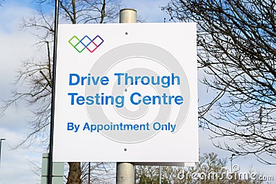 ISLEWORTH, LONDON, ENGLAND- 17th February 2021: Drive Through Testing Centre sign at West Middlesex University Hospital Editorial Stock Photo