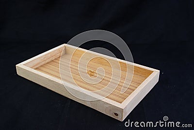 Isolate wooden long tray with edge on black back ground,with work path Stock Photo