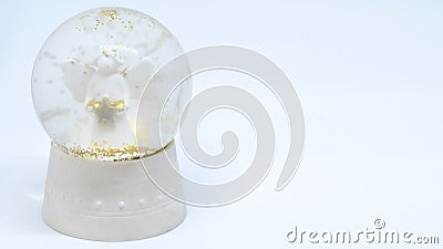 Isolated angel snow globe with golden snowflake Stock Photo