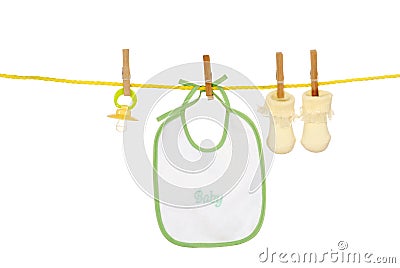 Isolated baby bib socks on a clothes line Stock Photo
