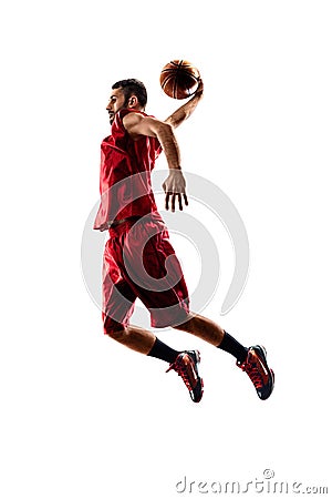 Isolated basketball player in action is flying Stock Photo