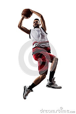 Isolated basketball player in action is flying Stock Photo