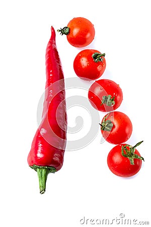 isolated cherry tomatoes and searing chilli. white background Stock Photo