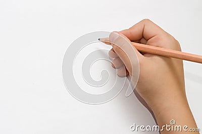 Isolated child hand writing Stock Photo