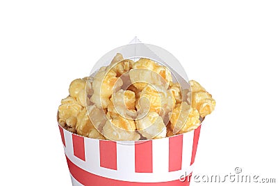 Isolated closeup caramel popcorn in a paper cone Stock Photo
