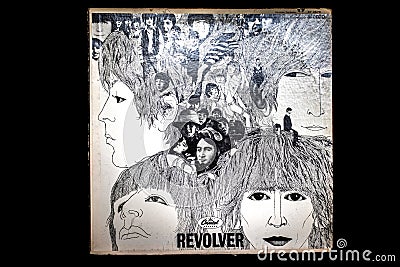 Isolated Closeup of Front of Worn Out The Beatles Revolver Vinyl Album Cover Editorial Stock Photo