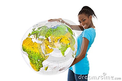 Isolated colored young woman holding a globe in her hands. Stock Photo