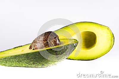 Vivid green colour avocado on a white background Stock Photo