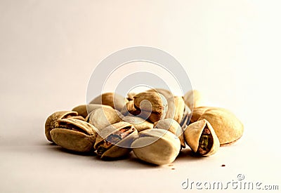 A group of pistachio nuts on white background Stock Photo