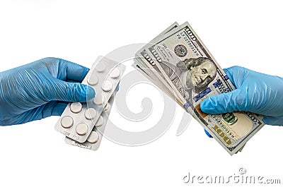 Isolated 2 hands in medical gloves with 100 dollars banknotes and pills on a white background. The concept of corruption or quaran Stock Photo