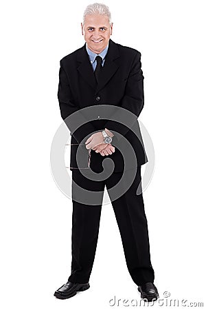 Isolated handsome mature business man standing Stock Photo