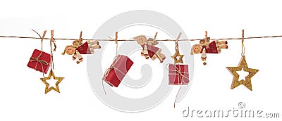 Isolated hanging red christmas gifts, angels and golden stars on Stock Photo