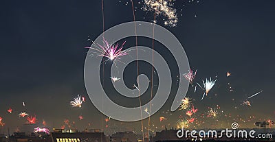 Isolated happy new year fireworks over the roofs of Vienna in Austria Stock Photo