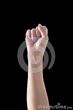 Isolated human`s arm with fist gesture on black background clipping path for Women rights empowering, international women`s day Stock Photo