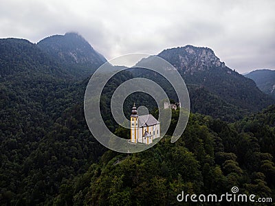 Isolated idyllic remote chapel church Sankt St Pankraz on rock hill Bad Reichenhall Berchtesgadener Land Bavaria Stock Photo