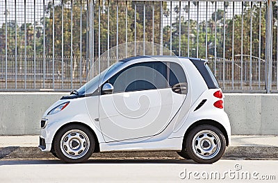 Isolated image of a late model Smart Car parked along the road Editorial Stock Photo