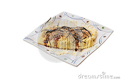 Isolated Japanese Omlette Topping with Sauce, Mayonaise, Katsuobushi dried, fermented, and smoked skipjack tuna and Seaweed Stock Photo