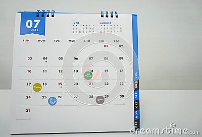 Isolated July calendar with meeting, appointment and bill payment Stock Photo