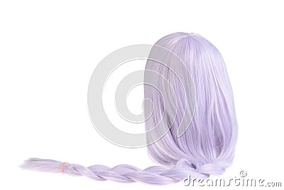 Isolated mauve colored wig with a ponytail Stock Photo