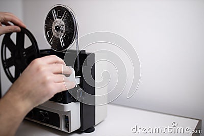 Isolated 8mm projector. Antique video technology. Old retro machine for films. Space for text Stock Photo