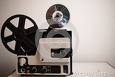 Isolated 8mm projector. Antique video technology. Old retro machine for films. Space for text Stock Photo