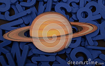 Isolated model of planet Saturn isolated on words education concept Stock Photo