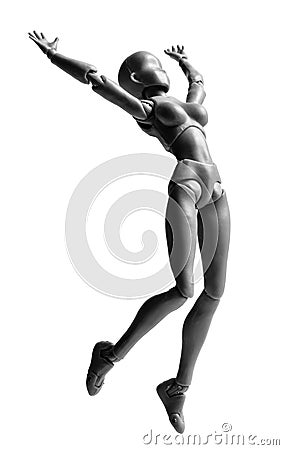 Isolated plastic human figure doll jumping in air Stock Photo