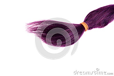 Isolated purple weft of hair with ponytail holder Stock Photo