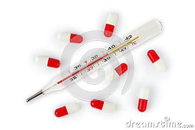 Isolated thermometer and pills Stock Photo