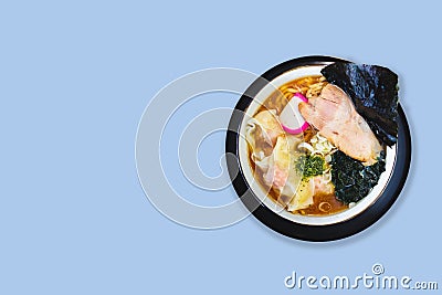 Isolated top view of Ramen Pork Bone Soup Tonkotsu Ramen with Chashu Pork, Scallion, Wanton, Menma Seasoned Bamboo Shoots. Stock Photo