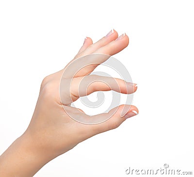 Isolated woman hand shows pinch to zoom or holding object Stock Photo