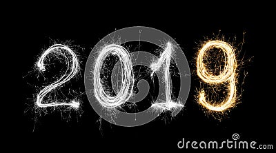 isolated 2019 written with Sparkle firework on black background, happy new year 2019 concept. Stock Photo