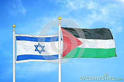 Israel and Palestine two flags on flagpoles and blue cloudy sky Stock Photo