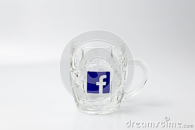 ISRAEL TEL AVIV 03/20/2019 , BEER GLASS OR MUG WITH FACEBOOK LOGO Editorial Stock Photo