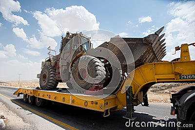 Israeli armored Caterpillar tractor in West Bank Editorial Stock Photo