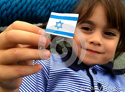 Israeli child holds Israel flag Stock Photo