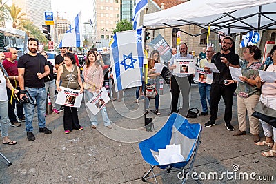 Israeli civillians gathered in solidarity for ceasefire between Israel and Gaza, holding banners for the missing and kidnapped Editorial Stock Photo