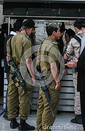 Israeli Defense Force Soldiers holding a chat during a break Editorial Stock Photo