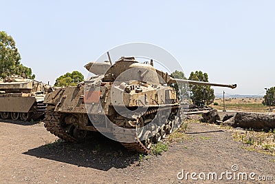 The Israeli tank is after the Doomsday Yom Kippur War on the Golan Heights in Israel, near the border with Syria Editorial Stock Photo