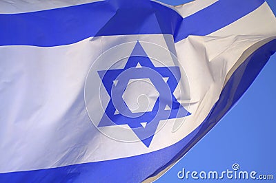 Israeli waving flag closeup Stock Photo